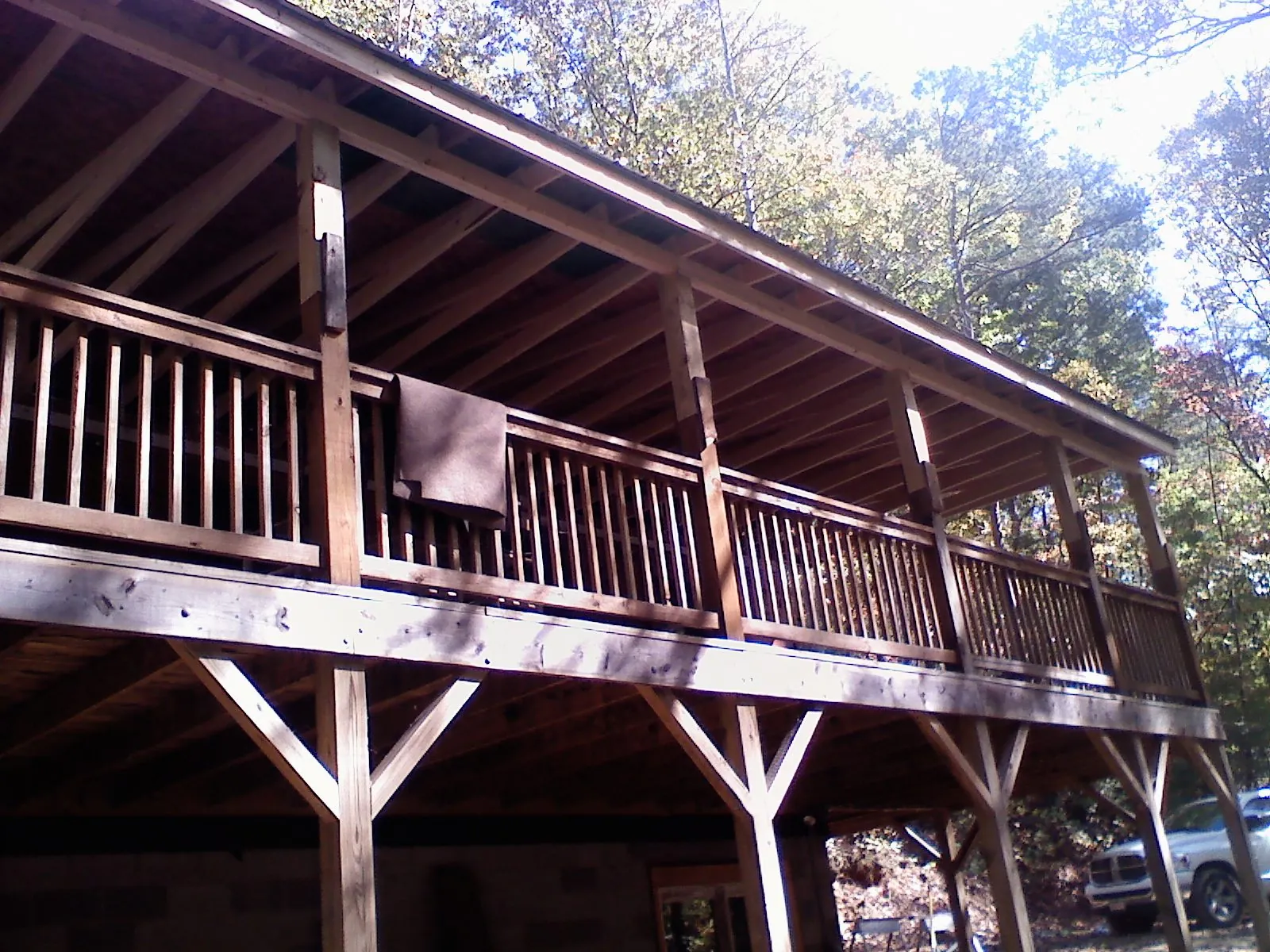Timber framing under a new elevated porch and deck — Roof Leak Repair in Lone Jack by Roofing Brothers
